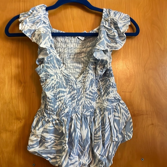 Japna Tops - Japna blue and white smocked V neck crop top with ruffled sleeves.